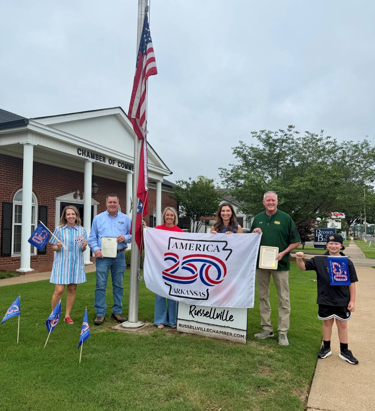 Christie Graham, Russellville Toursim Director, City of Russellville Mayor Fred Teague, Angela Bonds, Chief Community Development Officer for the Russellville Chamber of Commerce, Dr Megan Selman, Russellville Chamber of Commerce CEO, Pope County Judge Ben Cross, and Judge Cross’s grandson Tristan